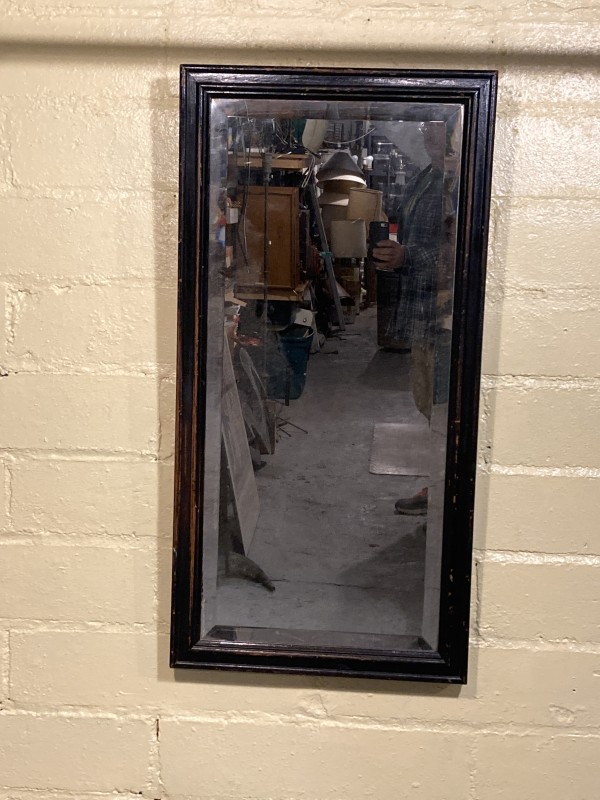 Vintage beveled mirror in black painted frame