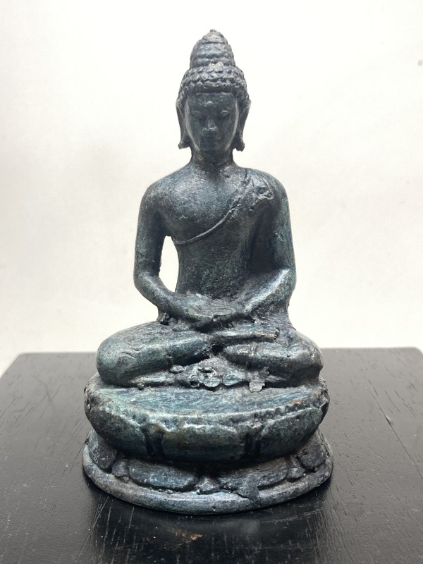 small metal buddha figure