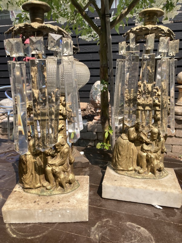 Pair of marble based figural garnitures with prisms