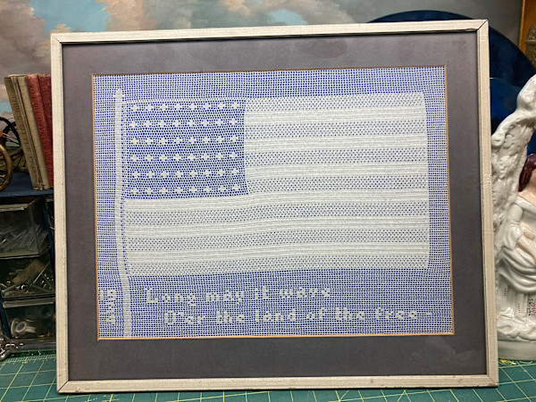 Framed sampler dated 1934 US Flag