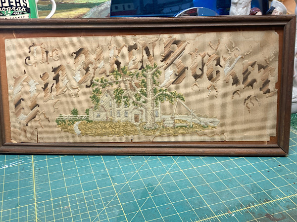 Framed cross-stitch "The Oaken Bucket"