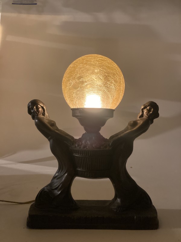 Art Deco woman light with yellow globe