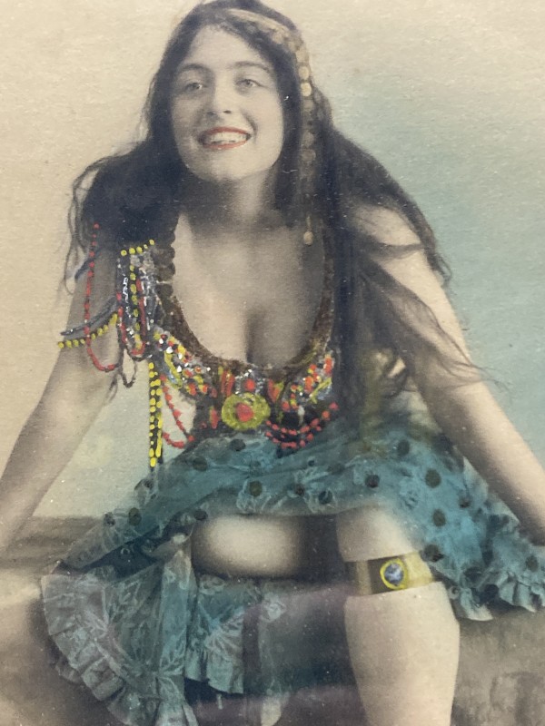 Framed hand colored photograph of a woman