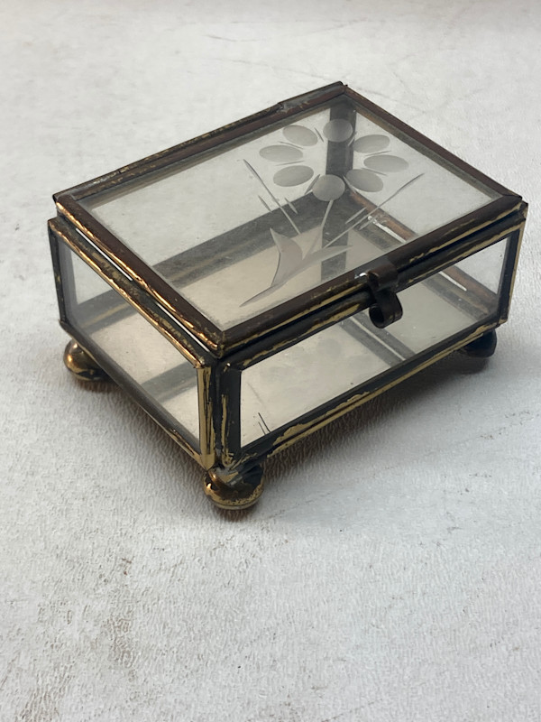 small metal trimmed glass jewelry box
