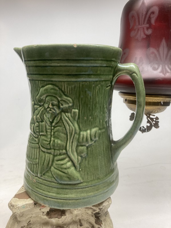 Green water pitcher with pirate