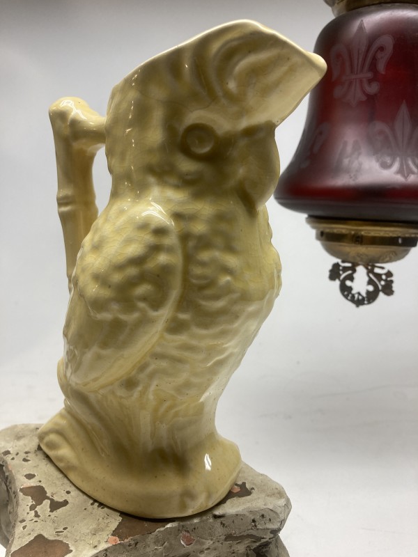 Yellow pottery parrot water pitcher