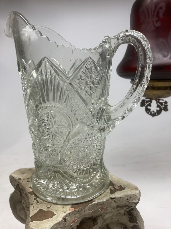 cut glass clear ornate water pitcher