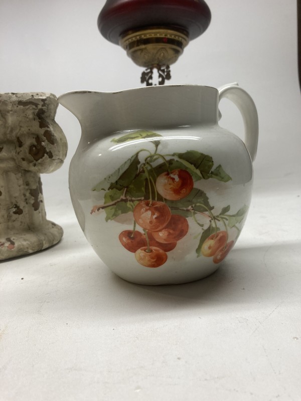 turn of the century water pitcher with cherries