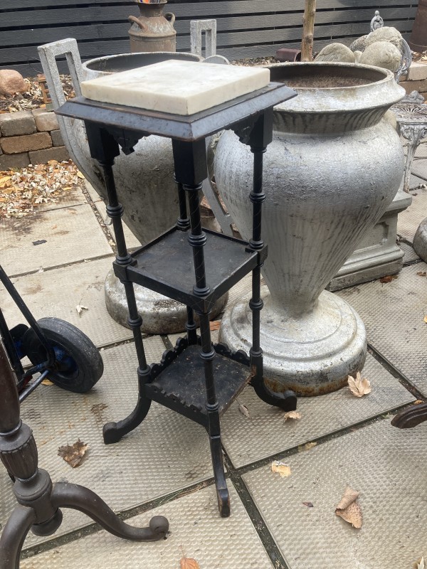 Tall turn of the century marble stand