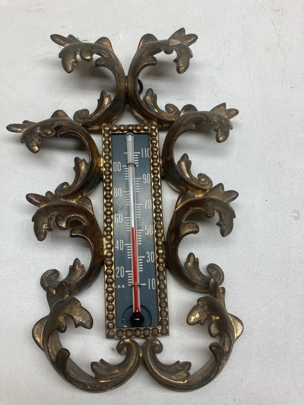 Turn of the century metal thermometer