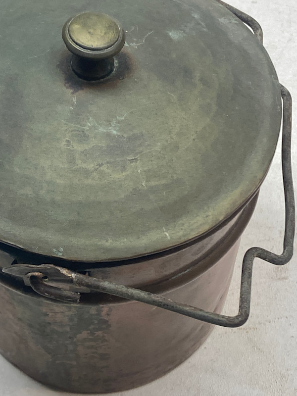 Small covered copper canister