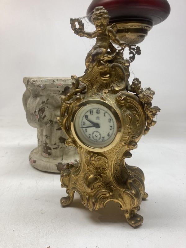 Ornate turn of the century metal clock