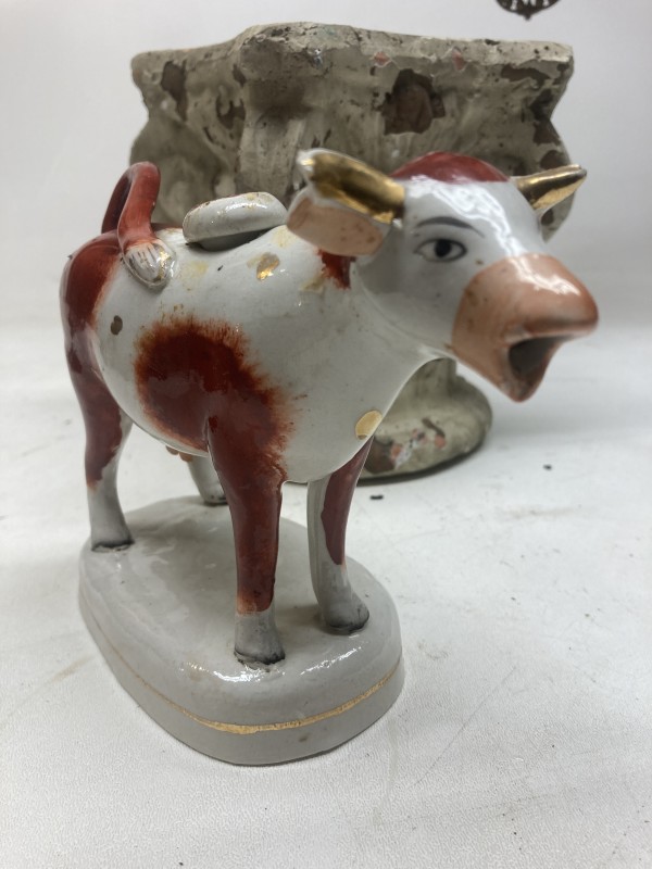 early soft paste porcelain cow creamer