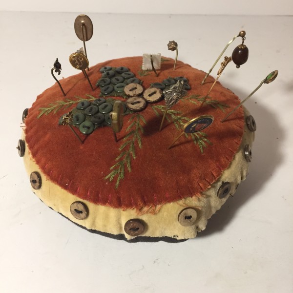 round pin cushion with pins