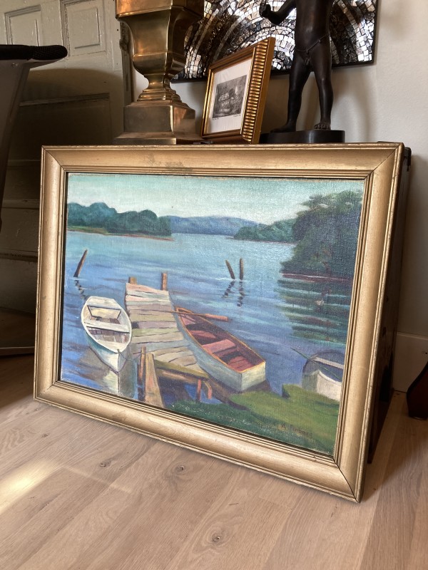 Framed painting of dock and boats