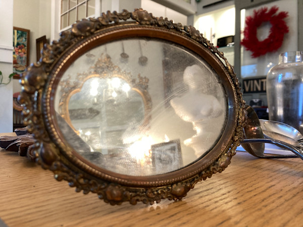 Small ornate dresser mirror