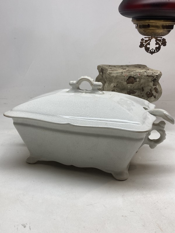 Ironstone covered casserole with ladle