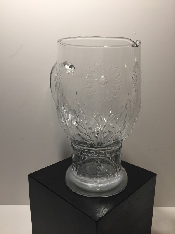 Art glass clear pitcher with pressed flowers