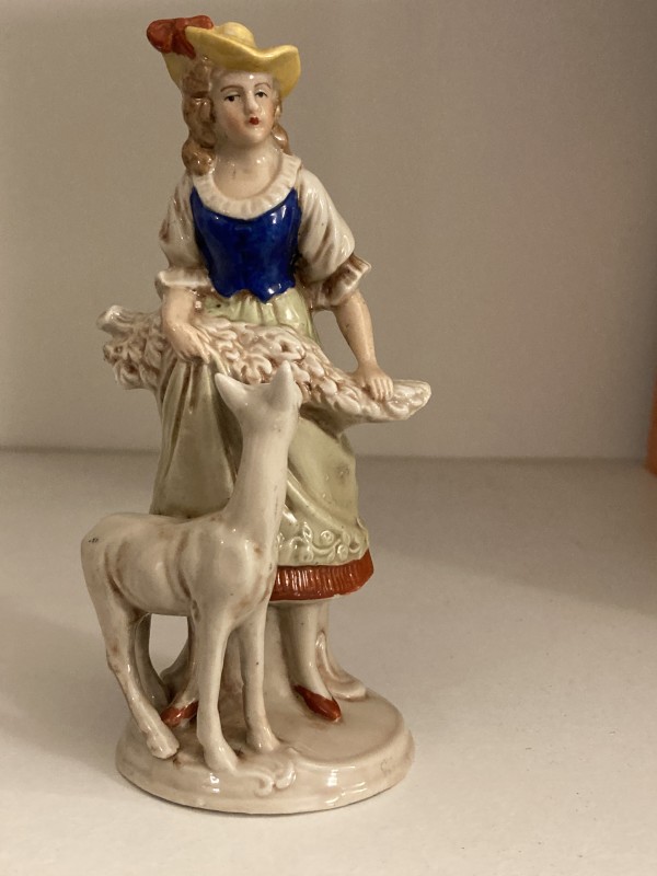 Porcelain figure of girl and deer