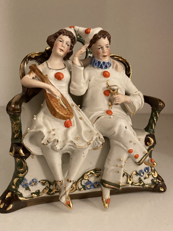 hand painted porcelain jester pair seated