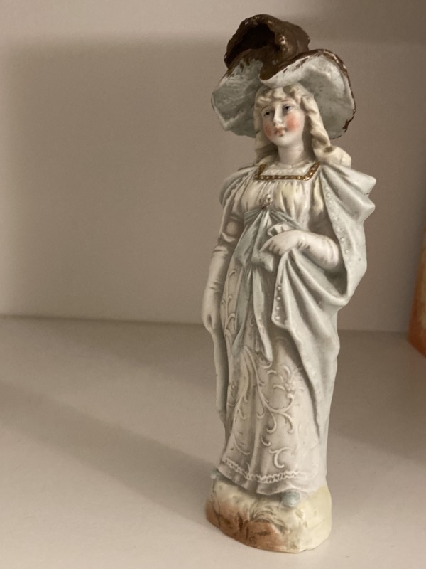 hand painted bisque figure of woman in dress