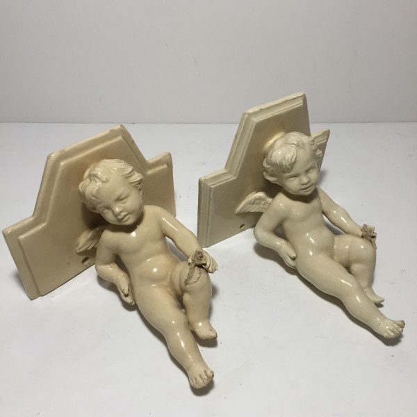 Pair of italian pottery cherubs