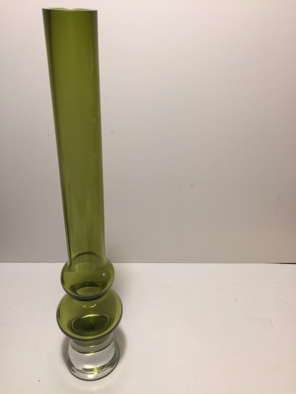 Tall narrow green art glass vase