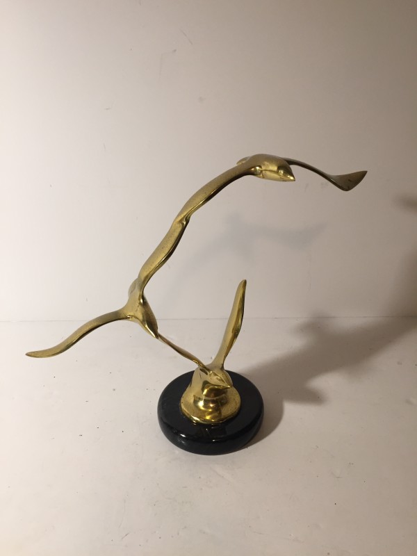 brass modern bird sculpture