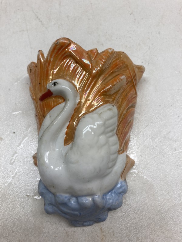 Small porcelain swan wall pocket