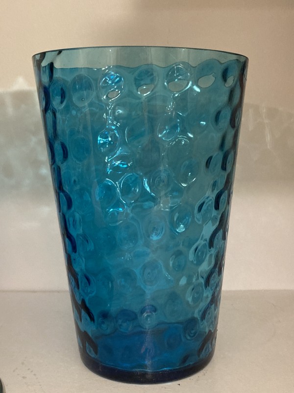 Blue art glass vase with coin dot pattern
