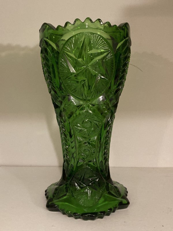 Deep cut green art glass vase