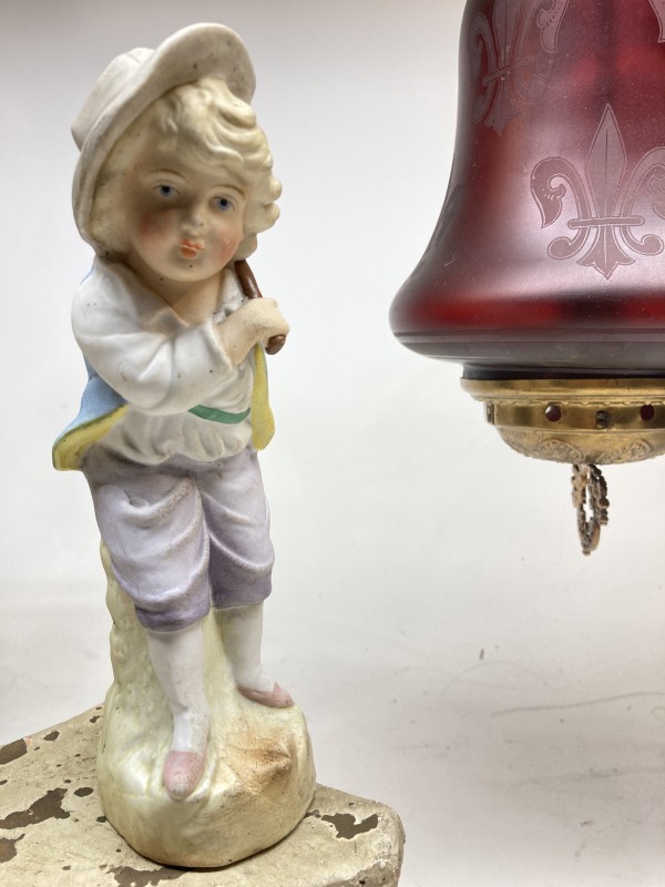 Hand painted boy porcelain figure
