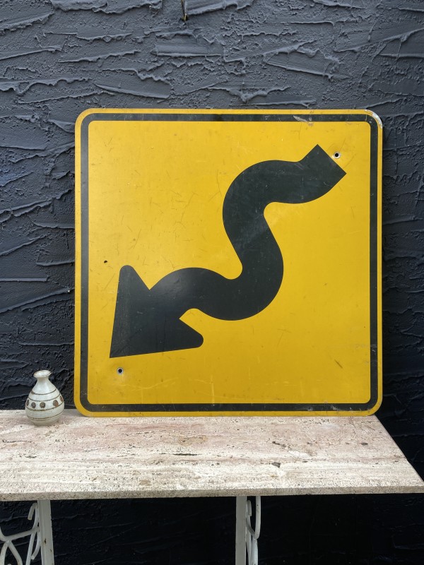 aluminum squiggle arrow street sign