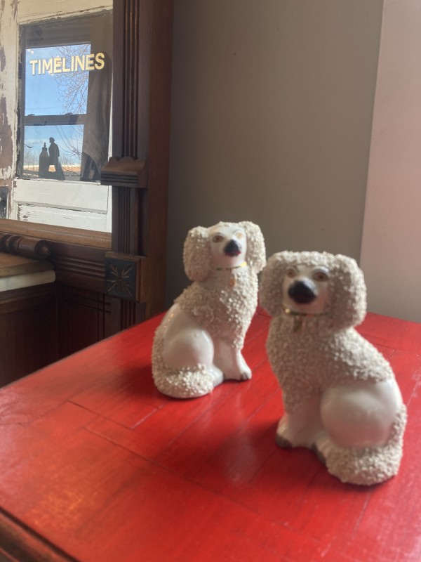 Pair of Staffordshire poodles