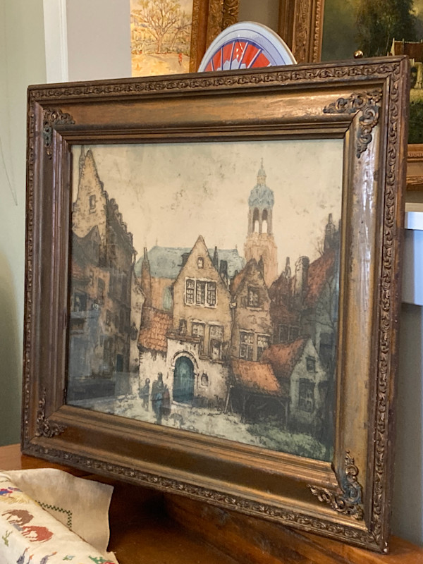 Framed hand colored etching