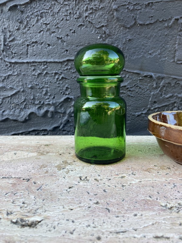 Belgian green covered bottle