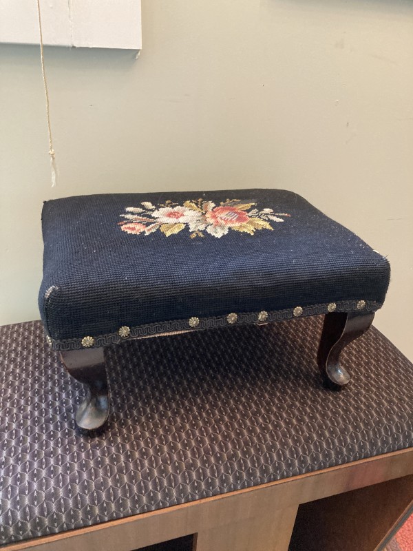 Small embroidered ottoman