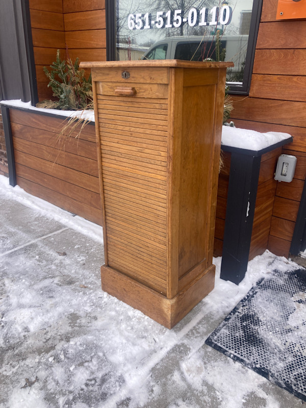 Narrow oak sheet music cabinet