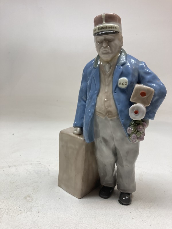 Train conductor porcelain figure