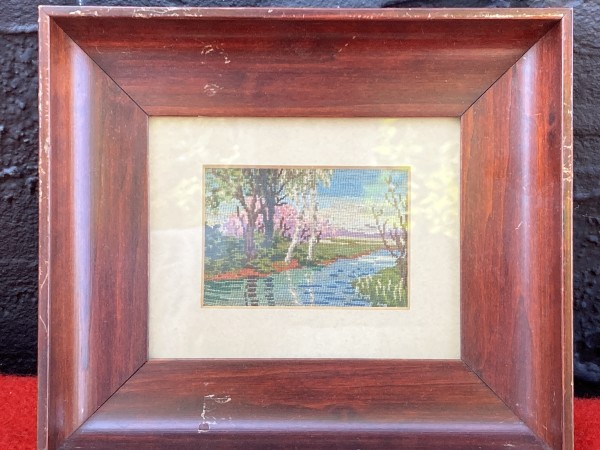 framed petit point embroidered scene