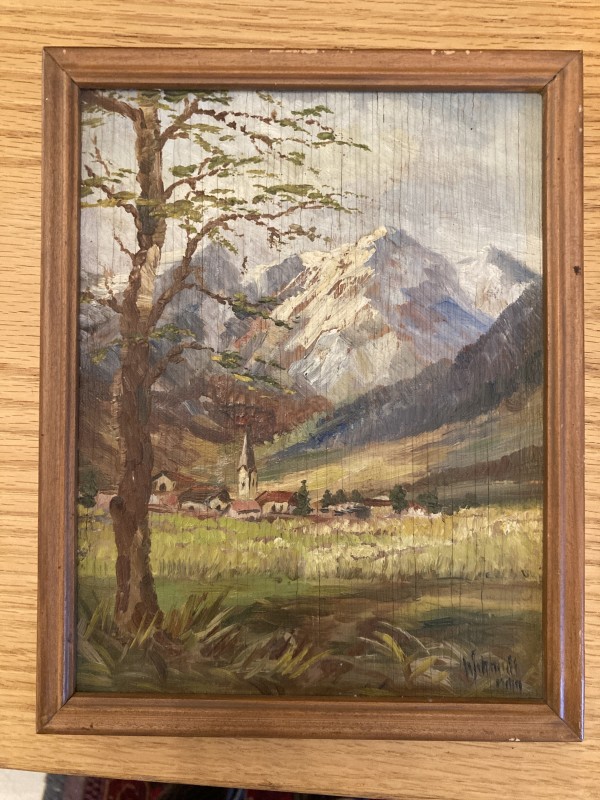 Framed mountain scene on board