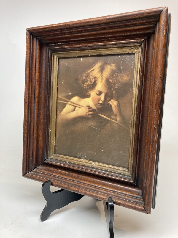 Framed photo of cupid