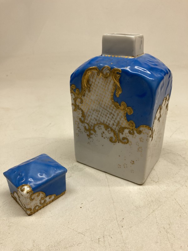 hand painted covered porcelain bottle