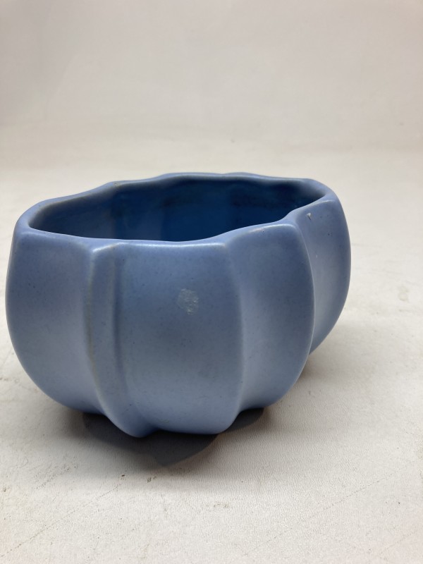 blue pottery vase with ribs