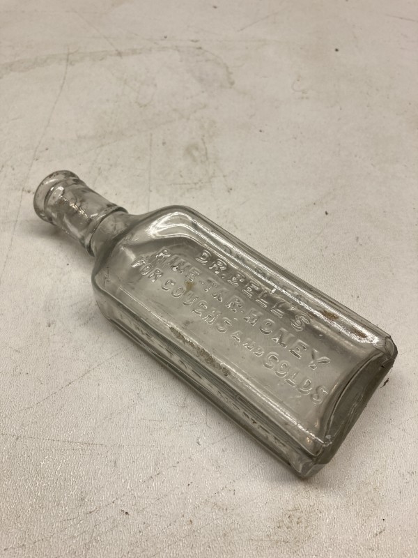 embossed vintage glass advertising bottle