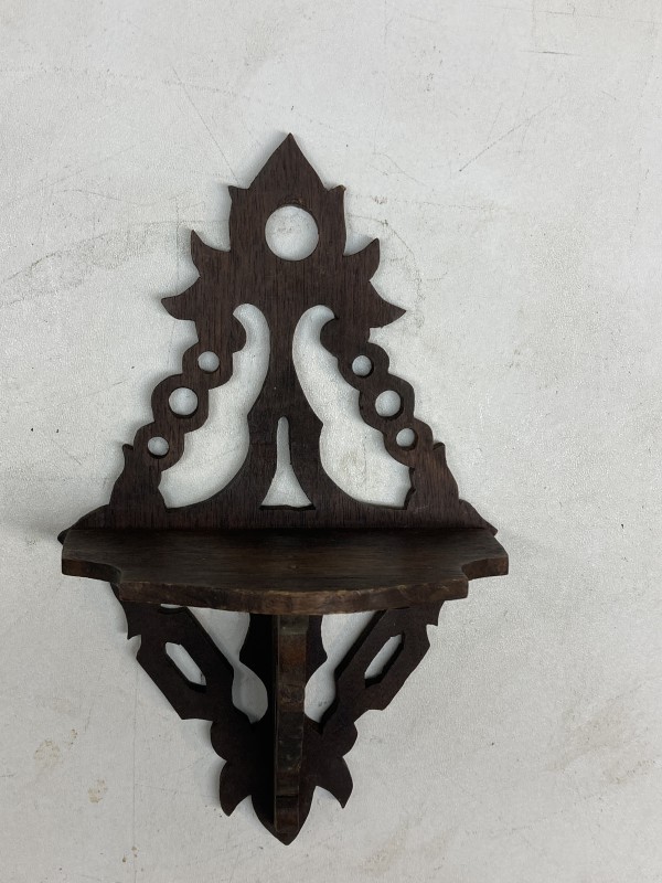 carved turn of the century shelf