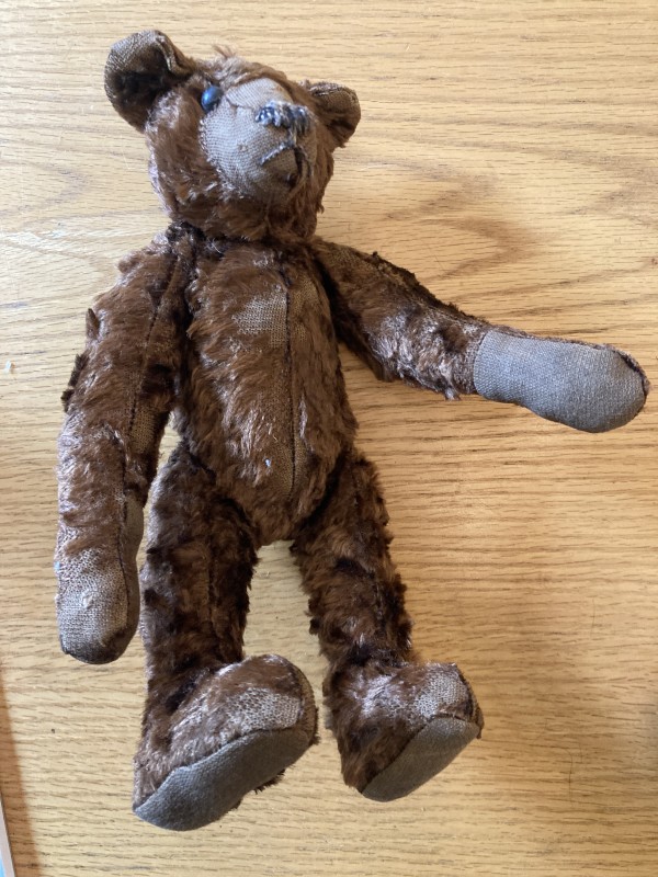 Vintage brown teddy bear with long arms