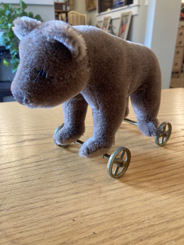 Steiff teddy bear on wheels