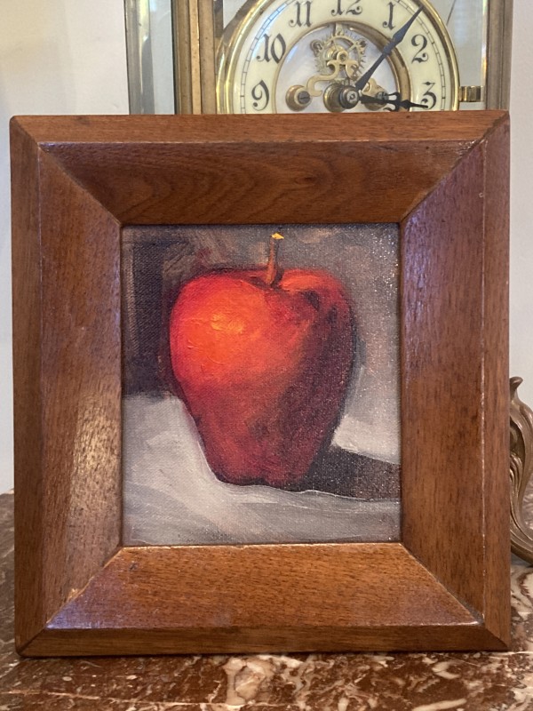 Framed oil painting of an apple