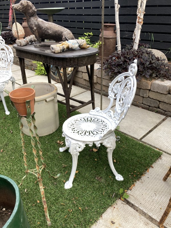 Pair of cast iron garden chairs